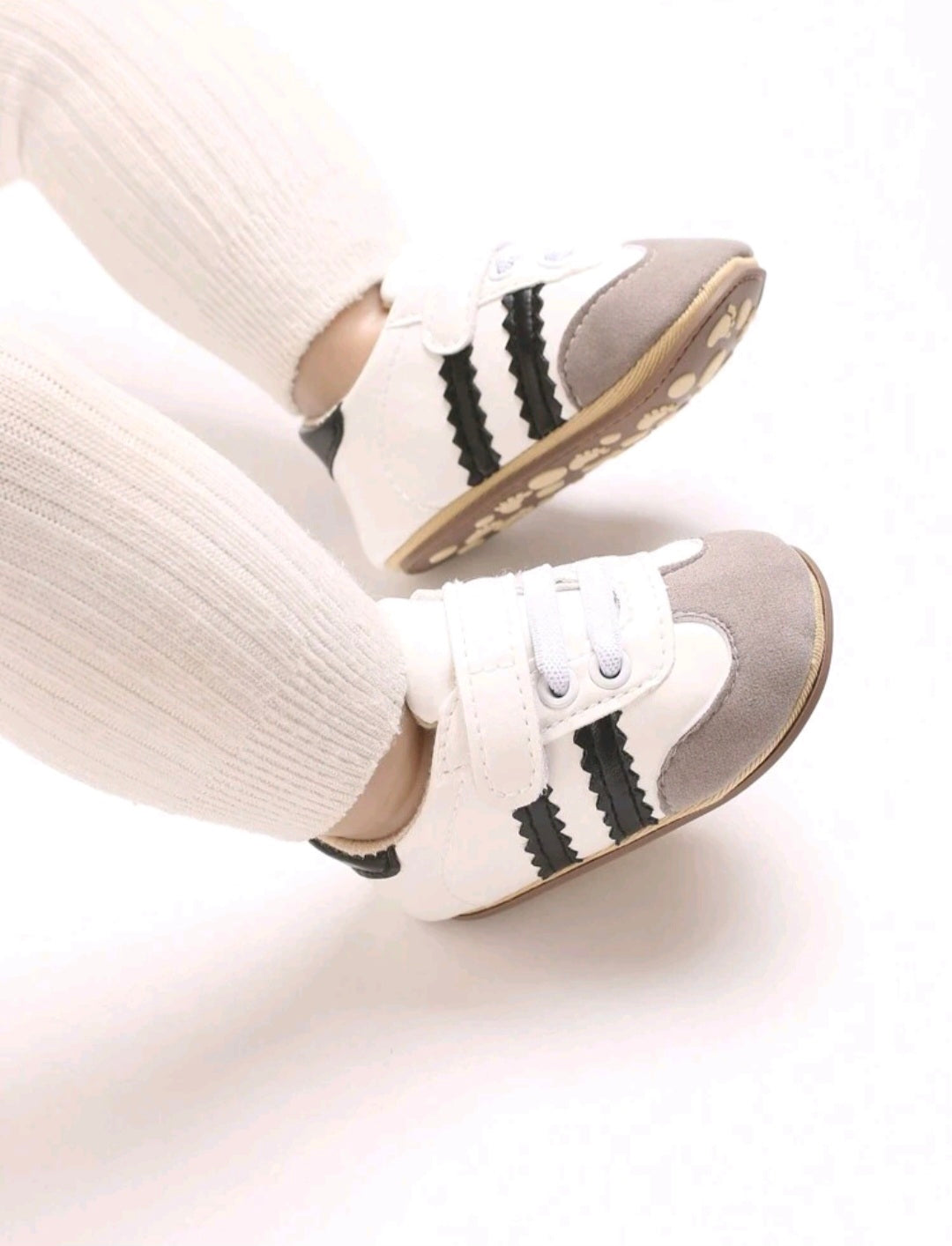 White Sneakers with Black Stripes